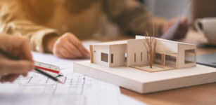 group of an architect working and discussing about an architectu